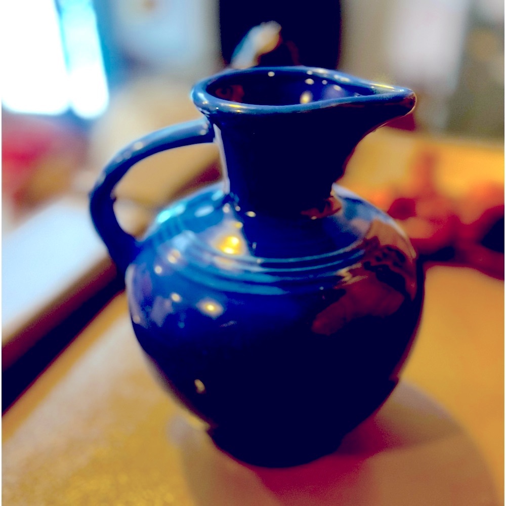 Vintage Fiesta Pitcher one tiny blemish on handle. Great Condition